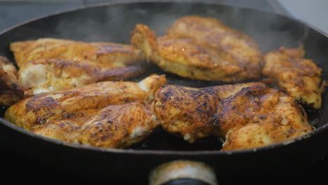 Close-up-of-pan-fried-sizzling-succulent-home-spice-chicken-part-of-good-balanced-healthy-diet