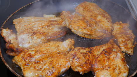 Above-view-of-pan-fried-sizzling-succulent-home-spice-chicken-part-of-good-balanced-nutritious-diet