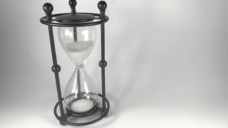 Black-based-hourglass-with-white-sands-of-time-falling-to-the-bottom-part,-ISOLATED,-STILL,-TIMELAPSE