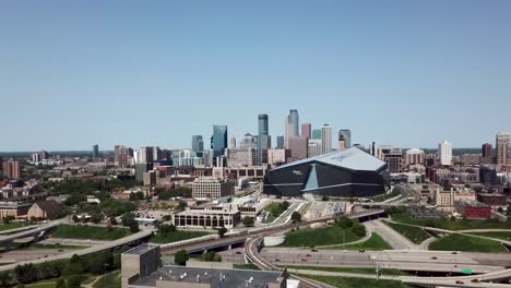 Midday-aerial-view-of-the-Minneapolis-skyline-on-a-summer-day