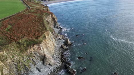 Aerial-view-of-clear-water-and-cliffs-along-copper-coast-in-the-South-of-Ireland