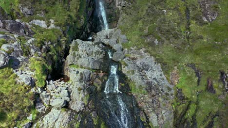 Aerial-view-of-isolated-rocky-mountain-waterfall-in-the-South-of-Ireland