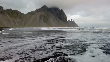 Waves-on-the-black-beach-at-Vestrahorn-mountain-in-Iceland
