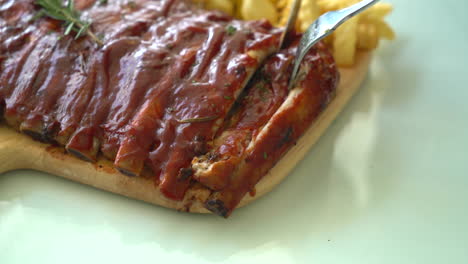 Grilled-rib-pork-with-barbecue-sauce-and-vegetable-and-frech-fries
