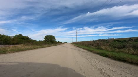 POV-through-driver's-window-while-driving-through-rural-Iowa