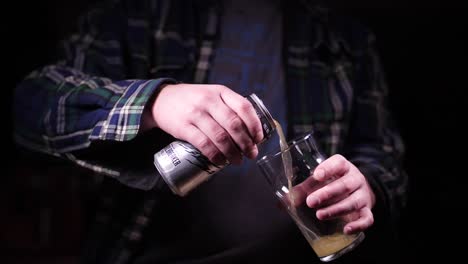Pouring-Beer-Can-into-Glass-Super-Slow-Motion-in-Black-Studio