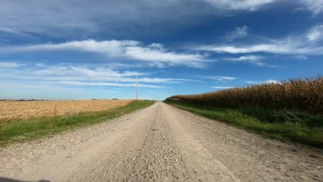 Point-of-view-footage-while-driving-down-a-gravel-road-in-rural-Iowa