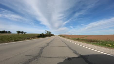 POV-through-driver's-window-while-driving-through-rural-Iowa
