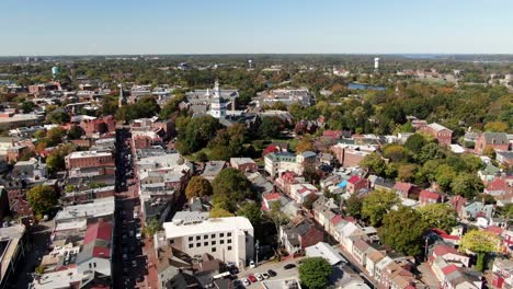 High-aerial-cinematic-turn-of-Annapolis-Maryland-State-House,-historic-district,-Old-Town