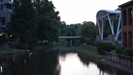 Bridge-shot-overlooking-a-river-in-Greenville,-SC