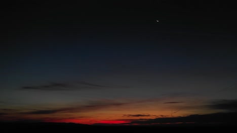 Orange-glow-on-dark-horizon-after-sunset