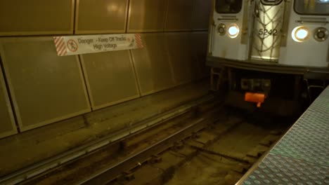 Static-shot-of-underground-subway-train-approaching-station-in-Chicago