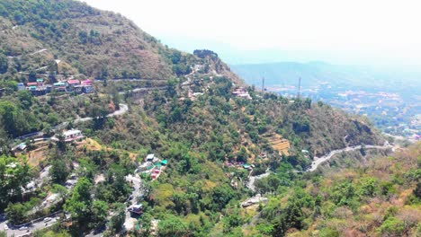 Dehradun-masuri-drone-passing-through-the-trees-and-reviling-the-mountain-[ass