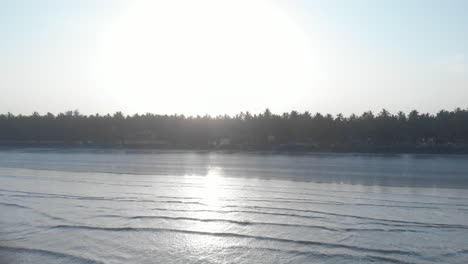 gorai-beach-black-sand-blue-sky-reflecting-on-wet-sand-sunrise