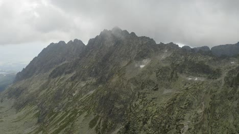 Mountain-Range-With-Amazing-Cloudy-Sky-In-the-Background-Near-Skok-Waterfall-and-Hrubý-vrch-in-the-High-Tatras-Mountains-in-Slovakia---Aerial-shot