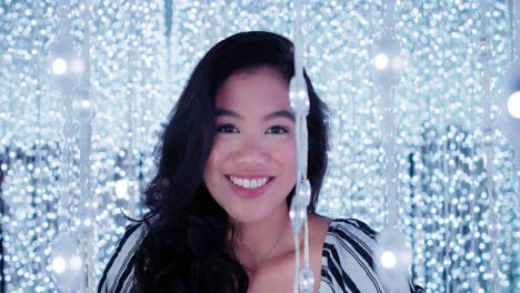 Pretty-Gorgeous-Young-Asian-Filipina-Woman-Smiling-and-Laughing-in-Cool-Fairy-Lights-in-4K-slow-motion