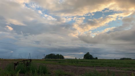 Glorious-Scenery-of-Clouds-Over-Agricultural-Field-in-Latvia---Time-Lapse