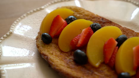 french-toast-with-peach,-strawberry-and-blueberries