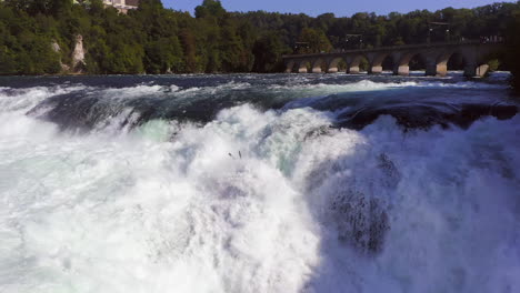 Slow-Motion:-Panning-shot-of-the-roaring-waterfall-Rheinfall-at-Schaffhausen-in-Switzerland