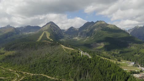Overview-of-Pine-Tree-Forest-Near-at-Štrbské-Pleso-City-in-High-Tatras-Mountain-in-Slovakia---Aerial-Shot