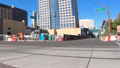 Time-lapse,-close-up-traffic-coming-toward-the-camera,-very-low-angle,-Jefferson-Street,-downtown,-Phoenix,-Arizona