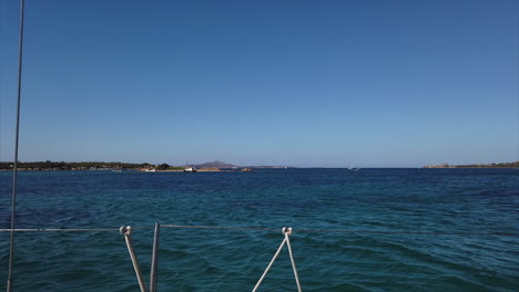 wide-shot-of-a-tiny-island-in-front-of-Cannigione,-Sardinia