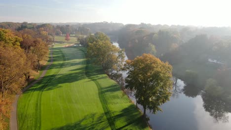 Beautiful-aerial-of-Lancaster-Country-Club,-Conestoga-River-fairway,-gorgeous-morning-light