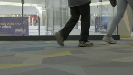 people-walking-by-the-camera-inside-the-shopping-mall-part-three