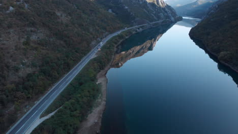 Scenic-mountain-road-alongside-River-Neretva-in-Bosnia,-aerial