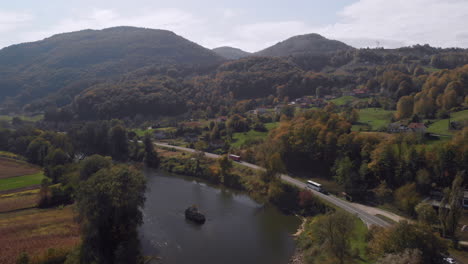 Autumnal-Bosna-River-Neretva-setting-in-Bosnia,-aerial-countryside-landscape