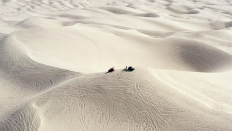ATVs-On-The-Hot-Imperial-Sand-Dunes-With-Clear-Blue-Sky-And-Sand-As-Far-As-The-Eye-Can-See---Aerial-Shot