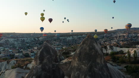 Early-morning-hot-air-balloon-flight-over-the-prehistoric-landscape-of-Goreme-Cappadocia