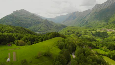Aerial-shot-of-beautiful-green-hills-and-mountains-in-Slovenia