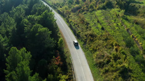 Tracking-shot-of-a-car-driving-through-the-classical-Croatian-mountainside