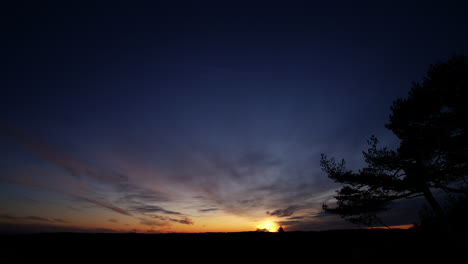 Time-lapse-shot-of-sunset,-from-the-Dyblemyrheia-hill,-on-sunny,-autumn-day,-in-Lillesand,-Aust-Agder,-South-Norway