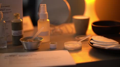 Panning-A-manicure-Display-Of-make-up,-Beauty-Products,-Essential-oils