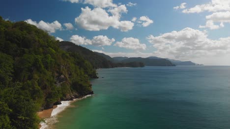 Drone-footage-of-a-northcoast-beach-in-La-Fillette-located-on-the-Caribbean-island-of-Trinidad-and-Tobago