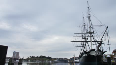 Wooden-Colonial-Ship-Docked-at-Harbor-4K