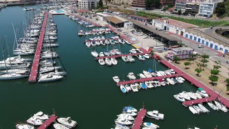 Aerial-view-above-Arenys-de-Mar-Spanish-harbour