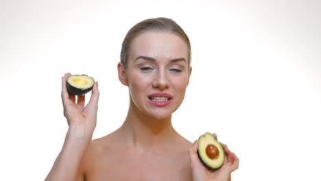 Happy-woman-enjoying-avocados