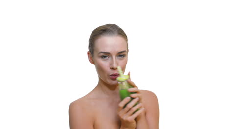 Woman-holding-a-bottle-with-green-kiwi,-avocado,-or-smoothie-drink-on-isolate-white-background