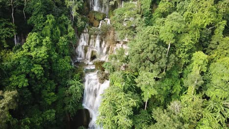 Impressive-Kuang-Si-Cascade-Falls-in-Laos-Jungle,-Cinematic-Aerial