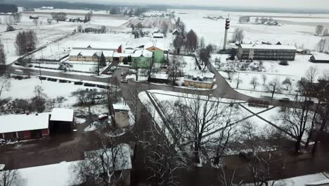 Scenic-aerial-view-over-old-suburban-village-during-warm-winter