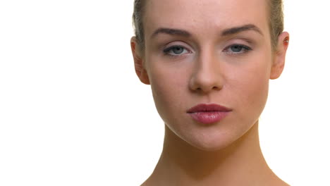 A-close-up-of-a-woman's-face-with-a-neutral-expression