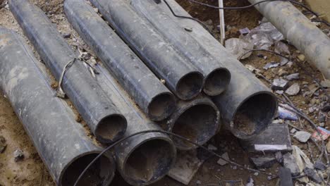 Group-of-pipes-laid-down-for-construction-of-a-drainage-in-between-the-street