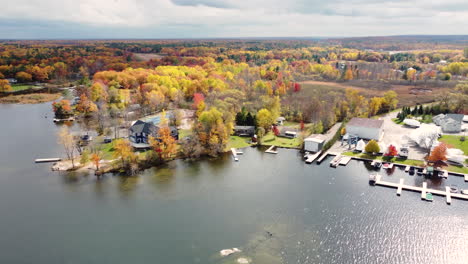Drone-shot-of-a-dock-in-the-forrest-during-fall-in-the-month-of-October