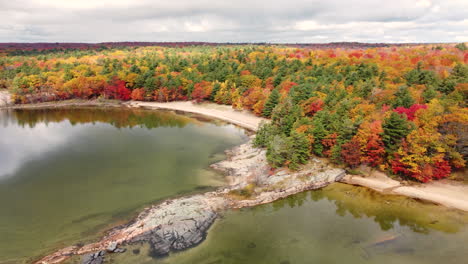Drone-shot-of-a-beach-at-Killbear-Provincial-Park-during-fall-in-the-month-of-October
