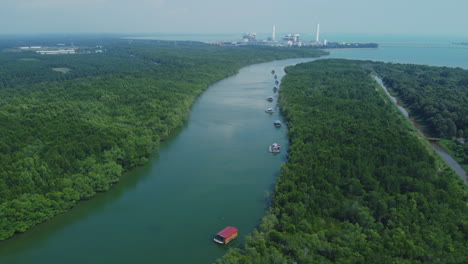 Aerial-drone-View-of-Bagan-Lalang-river-in-the-morning-with-floating-housees
