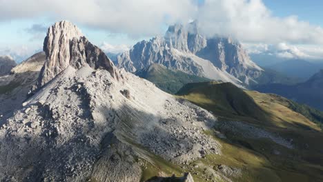 Monte-Pelmo-mountain-peak-covered-in-clouds,-mountain-landscape-in-Italian-Dolomites-aerial-view
