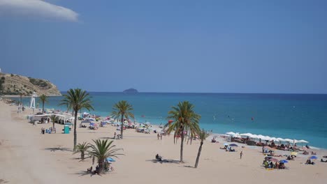 Panning-shot-of-Paraiso-beach-at-Villajoyosa-,-in-Alicante,-Valencian-Community,-Spain
